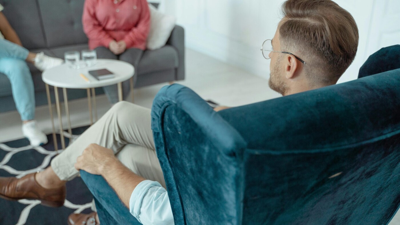 Untitled design – 2025-11-20T130819.471 Supportive family meeting for an intervention discussion.